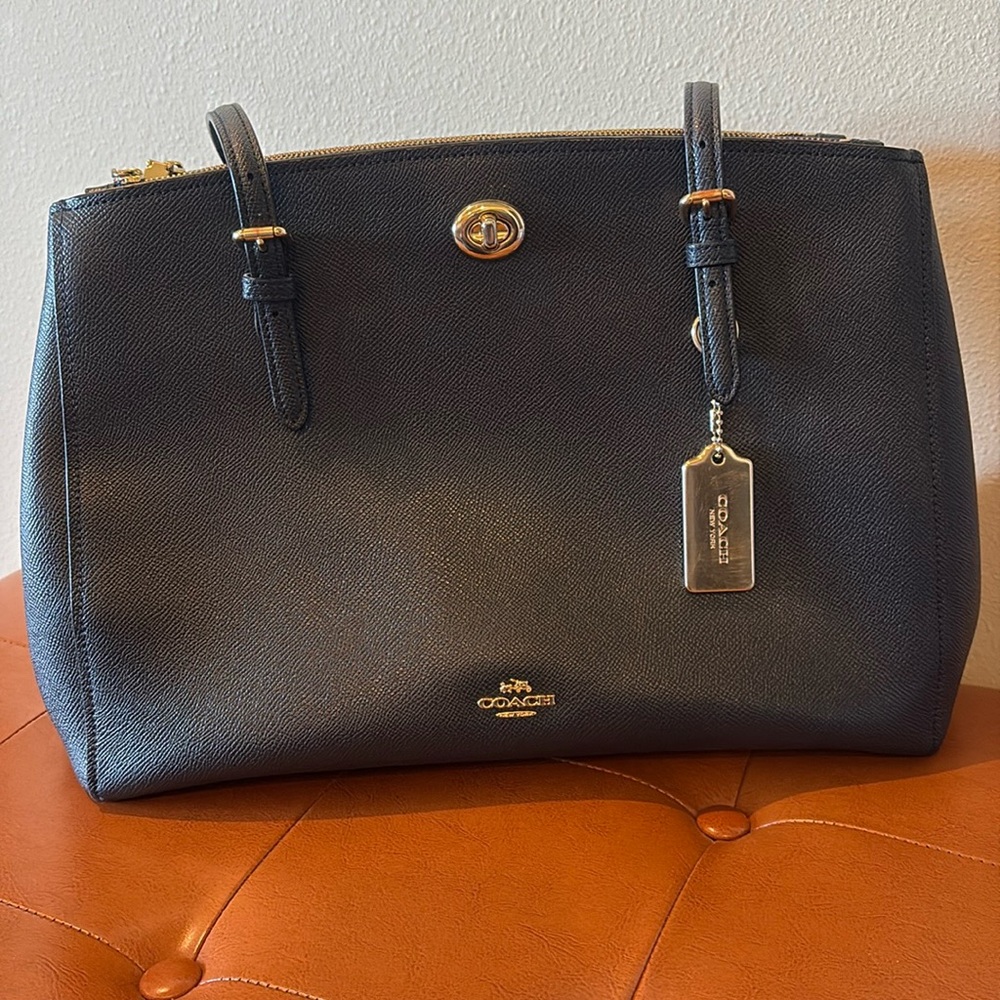 COACH Turnlock Carryall purse.